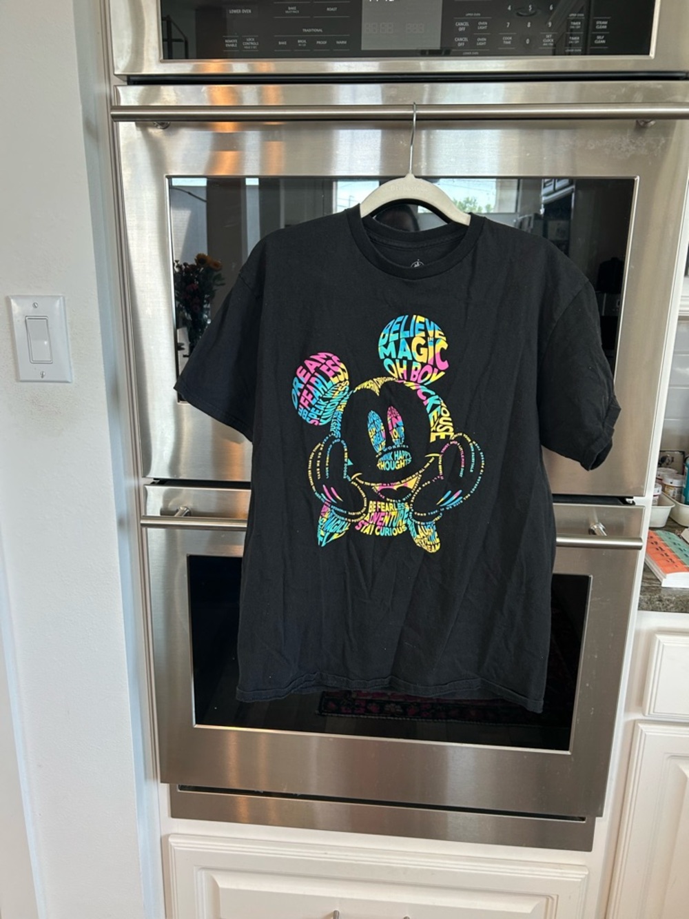 Disney women’s rainbow typography Tee size L slight wear overall GUC